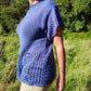 woman wearing lace eyelet tee knitting pattern in field